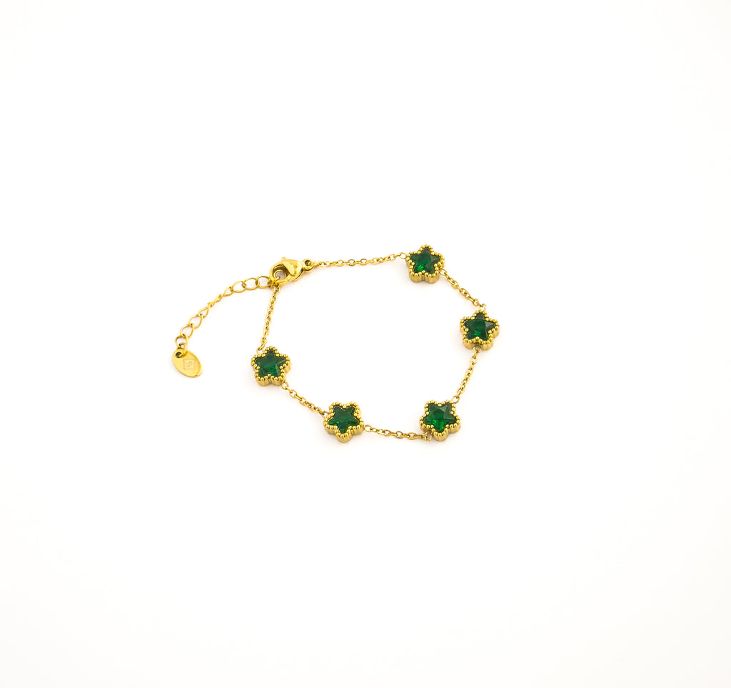 Gold bracelet with green clover gemstones
