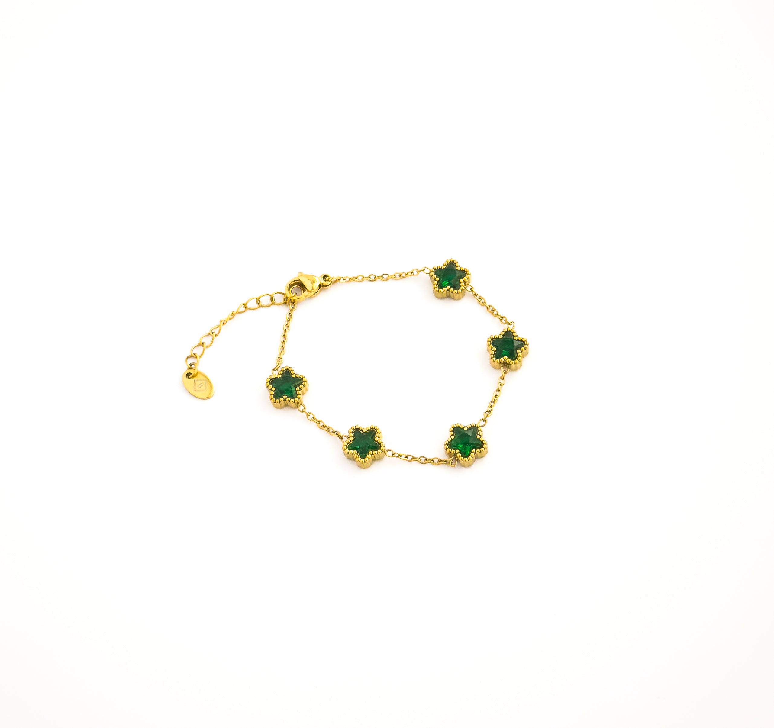 Gold bracelet with green clover gemstones